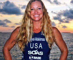 Coach Renee Makimaa sitting at table